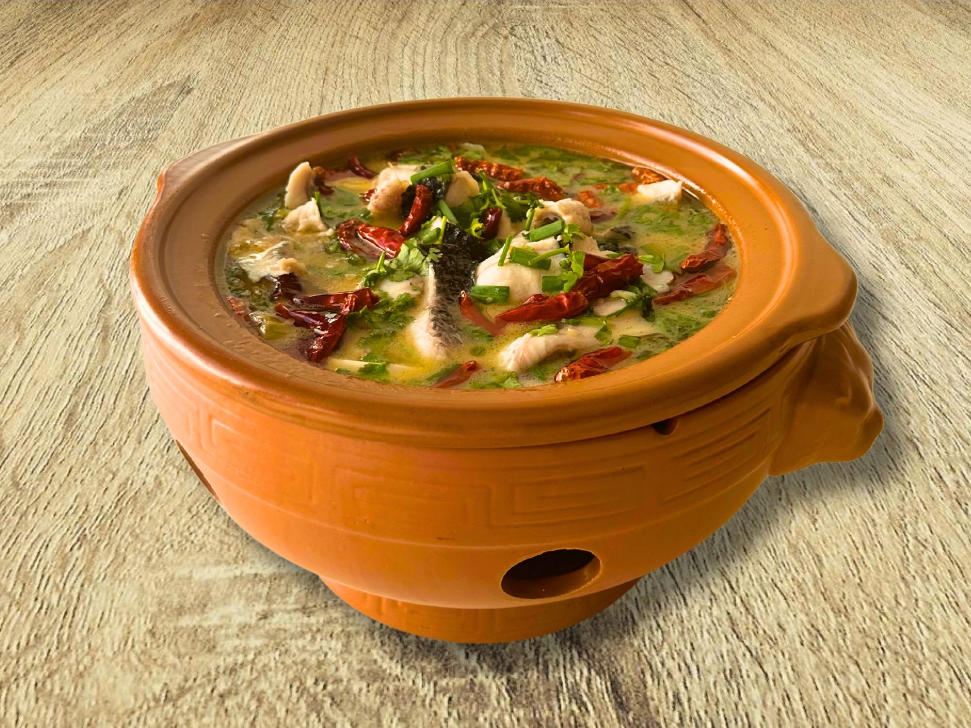 Canh cá nấu dưa chua cay